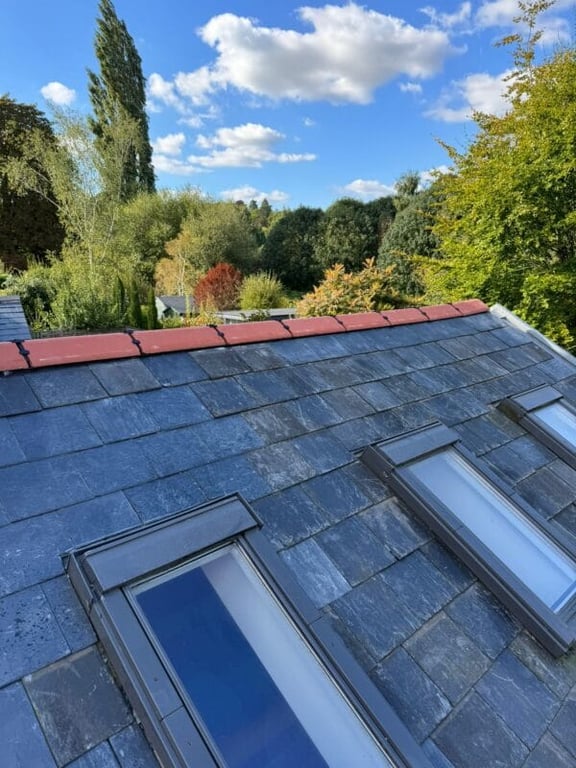 Pitched tile roof by JH King Roofing